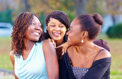 three females smiling