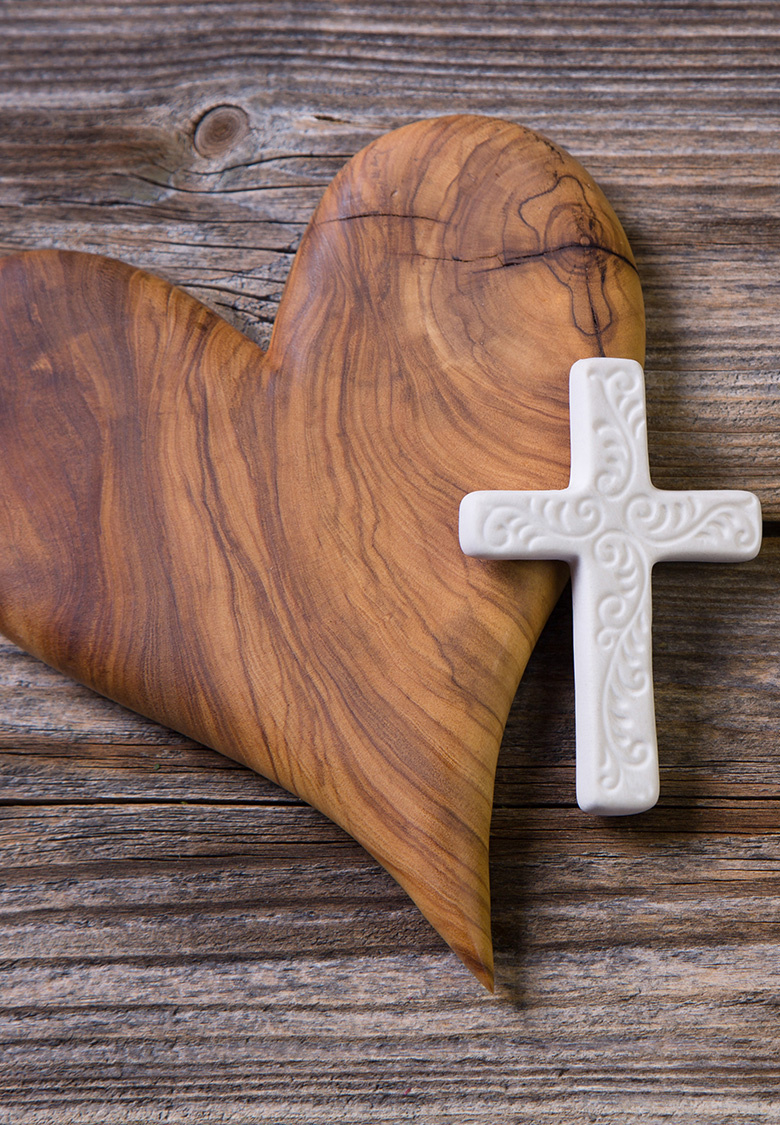 wooden heart with white cross