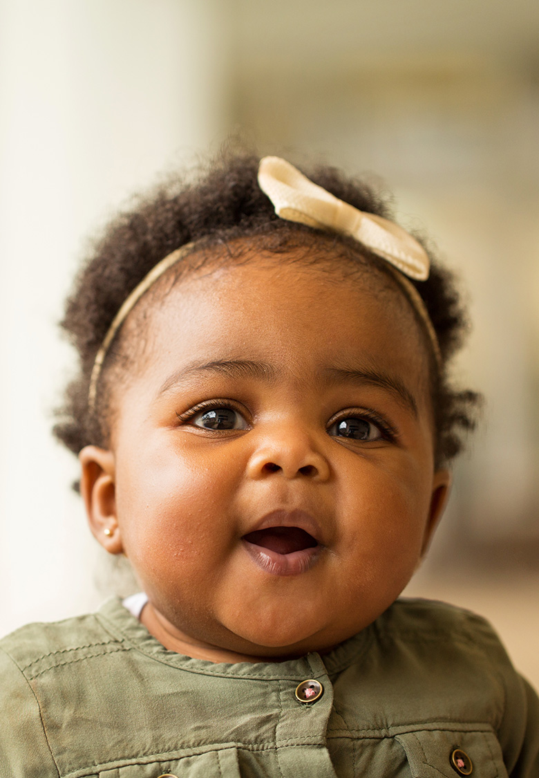 female baby with bow in her hair